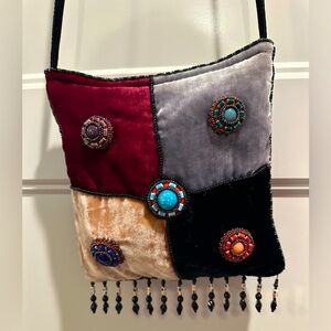 Beautiful delicate silk velvet purse.  Exquisite beading all sides, Silk lined.